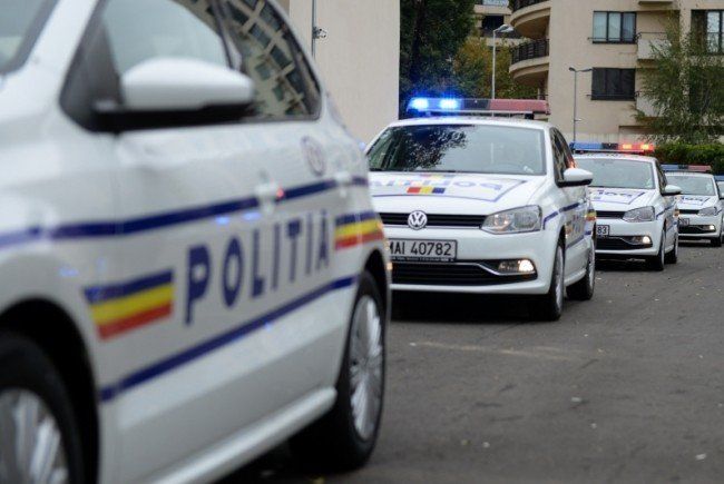 Grup de preșcolari în vizită la poliția locală